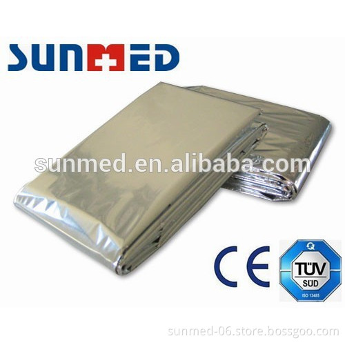 Emergency warming thermal blanket